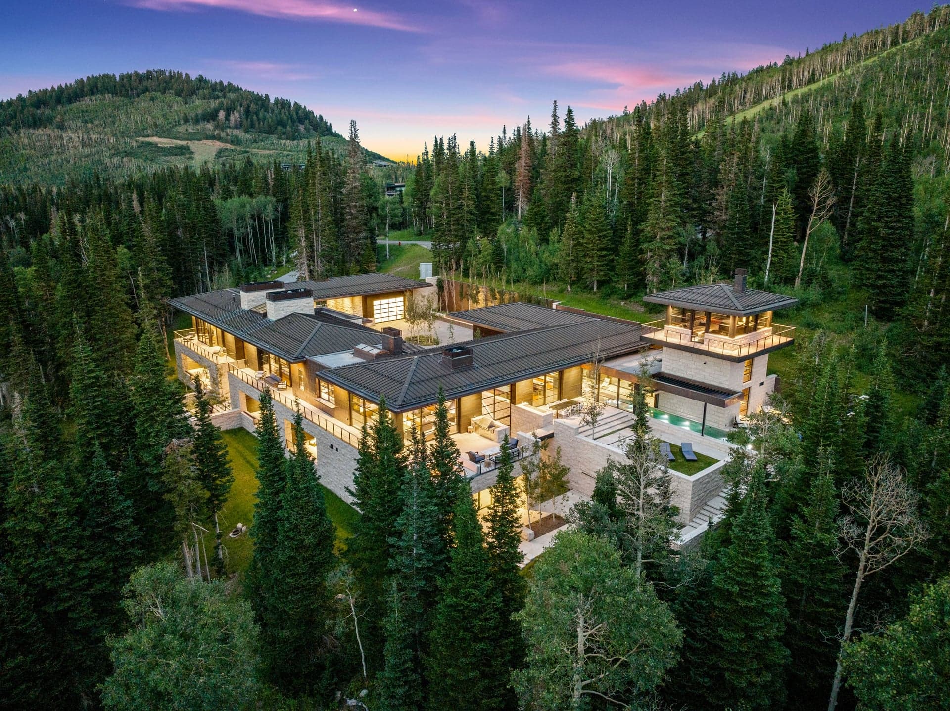 Aerial View Of Property at Sunset.
