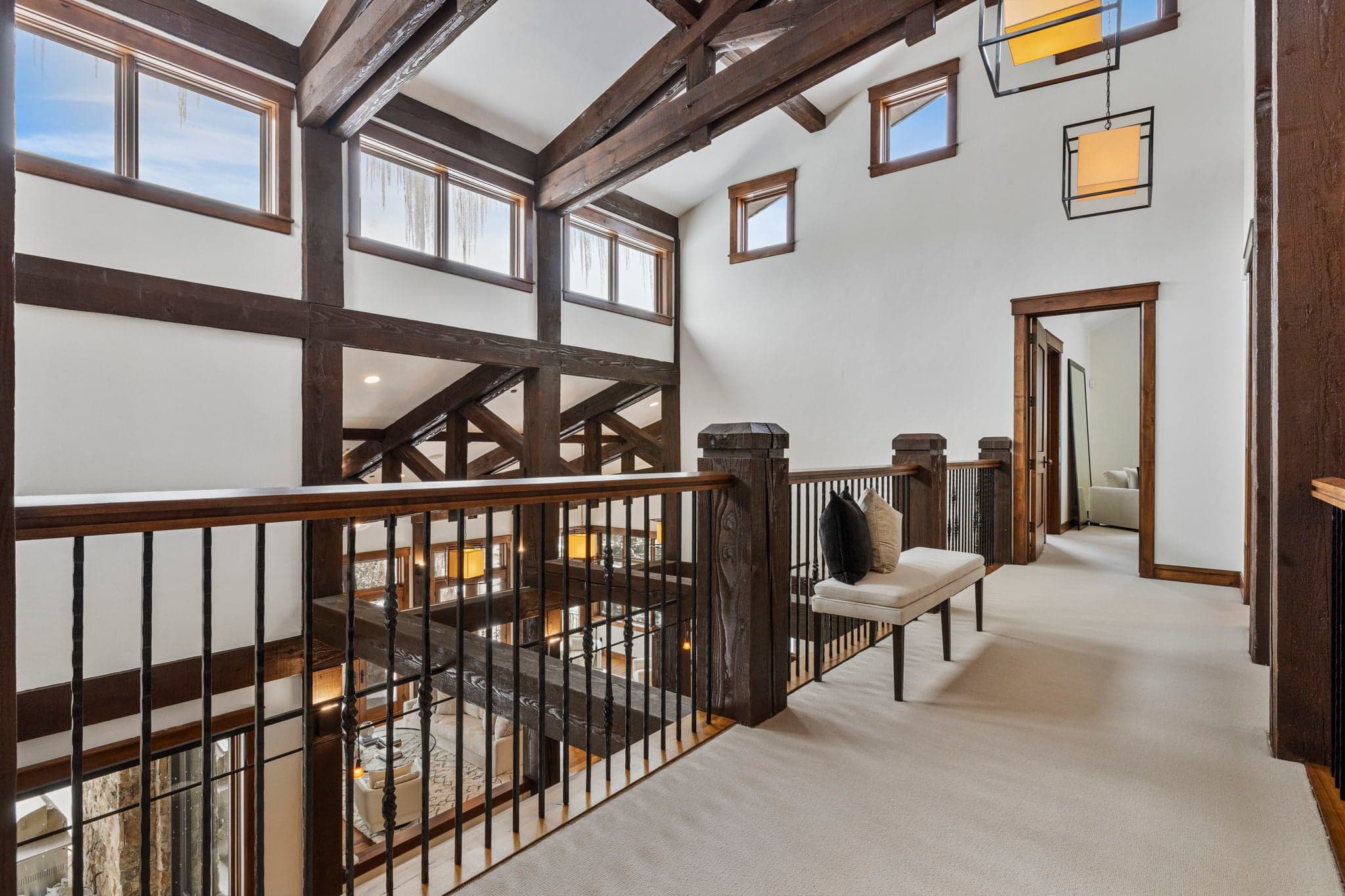 upper breezway with views of the first floor and lots of windows and mountain views