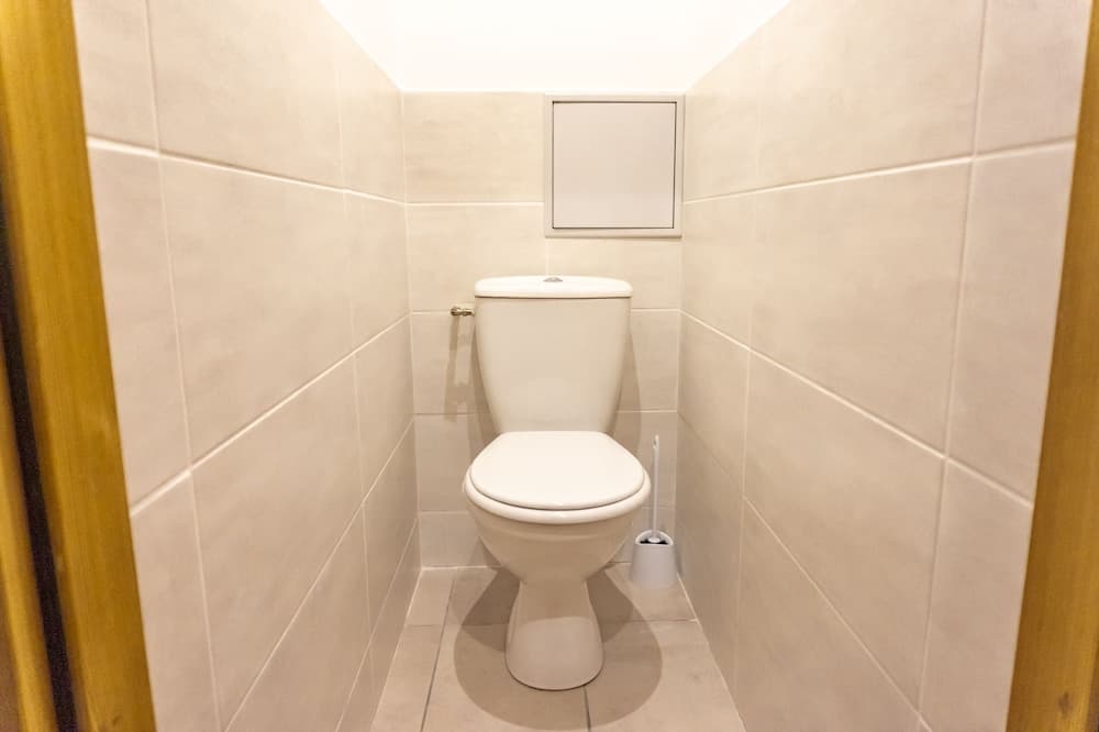 Raised toilet seat